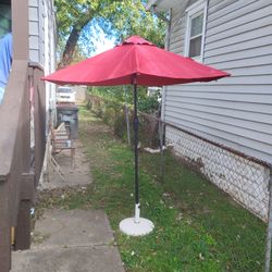 Patio umbrella w stand / 70.00