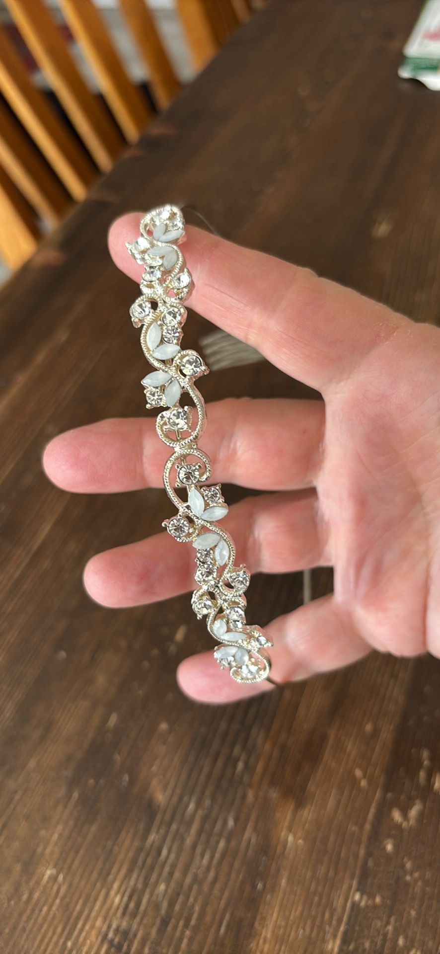 Silvertone tiara with clear rhinestone and white petal stones  clips for hair  5.25”