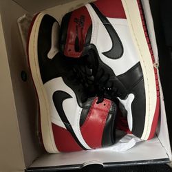 Air Jordan 1 Retro High OG "Black Toe Reimagined".