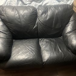 Black leather loveseat