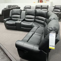 New Reclining Sectional .  Black Leather .  111” X 98”.  Free Delivery !