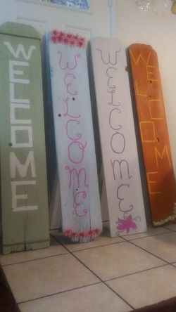 Boards with welcome signs