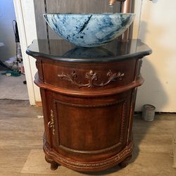 Bathroom vanity with sink and mirror cabinet