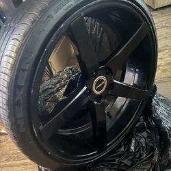 4 Tires With Black Rims 