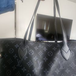 Neverfull tote bag in the Monogram Eclipse canvas. 