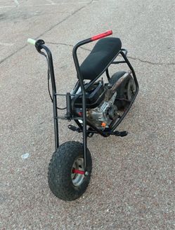 Minibike with predator 212 has carb and exhaust