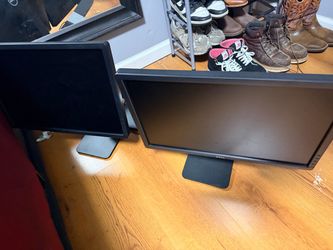 2 Dell monitors with stand