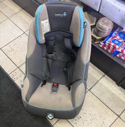Safety 1st convertible car seat with blue trim. This seat has a five-point harness system and side impact protection. The fabric cover is removable fo