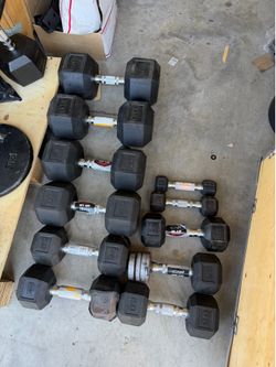 11 rubber dumbbells in TOTAL. SOLD AS IS 1-3-5-15lb and pair of 20,25 and 1-40,45,60,65lb