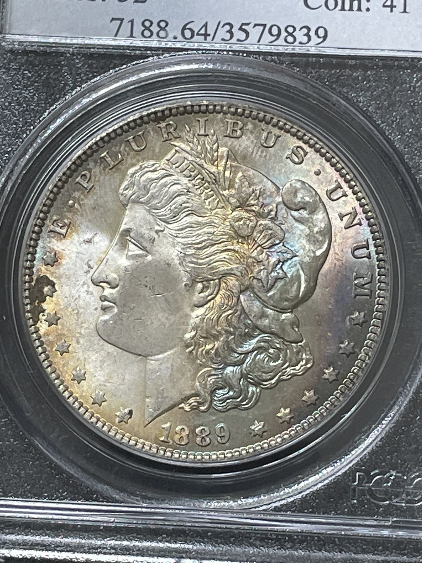 1889 P Morgan Dollar With Exceptional Rainbow Toning PCGS MS 64