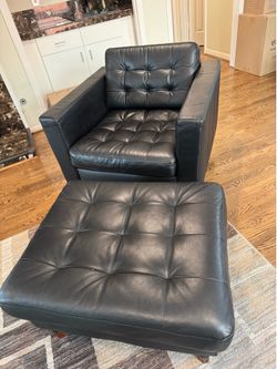 Black leather chair and ottoman