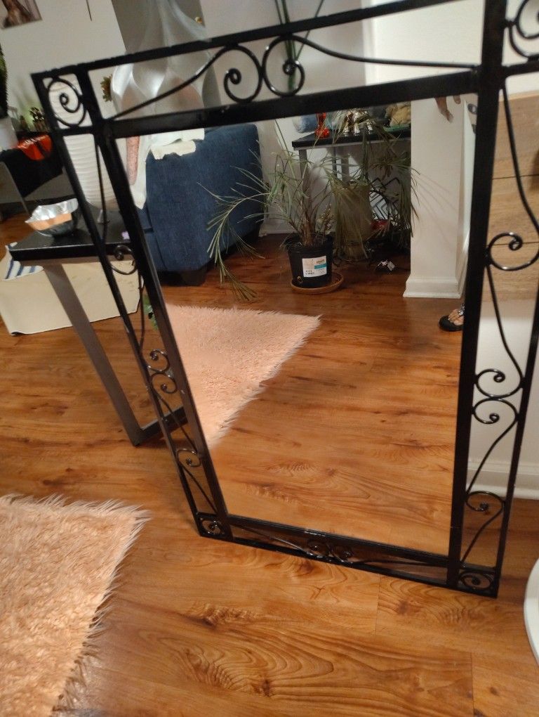 A VERY LARGE MIRROR BEAUTIFUL DESIGNED