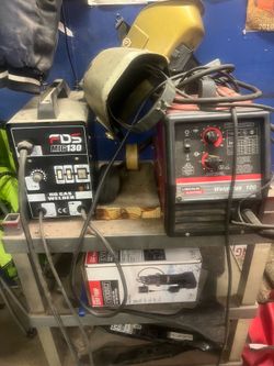 2 welders and 2 shields