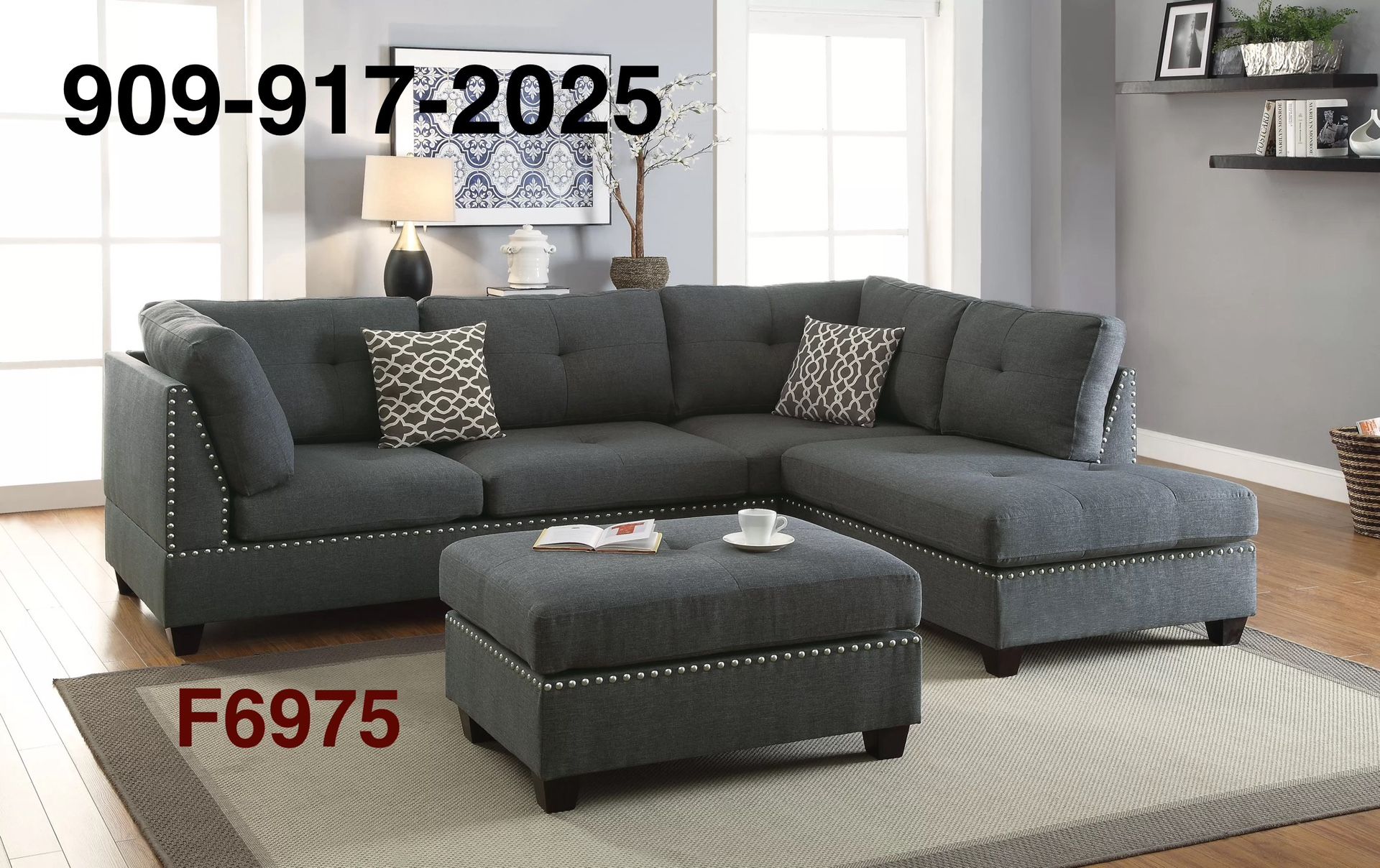 BLUE GREY SECTIONAL WITH ACCENT STUDDING. OTTOMAN INCLUDED