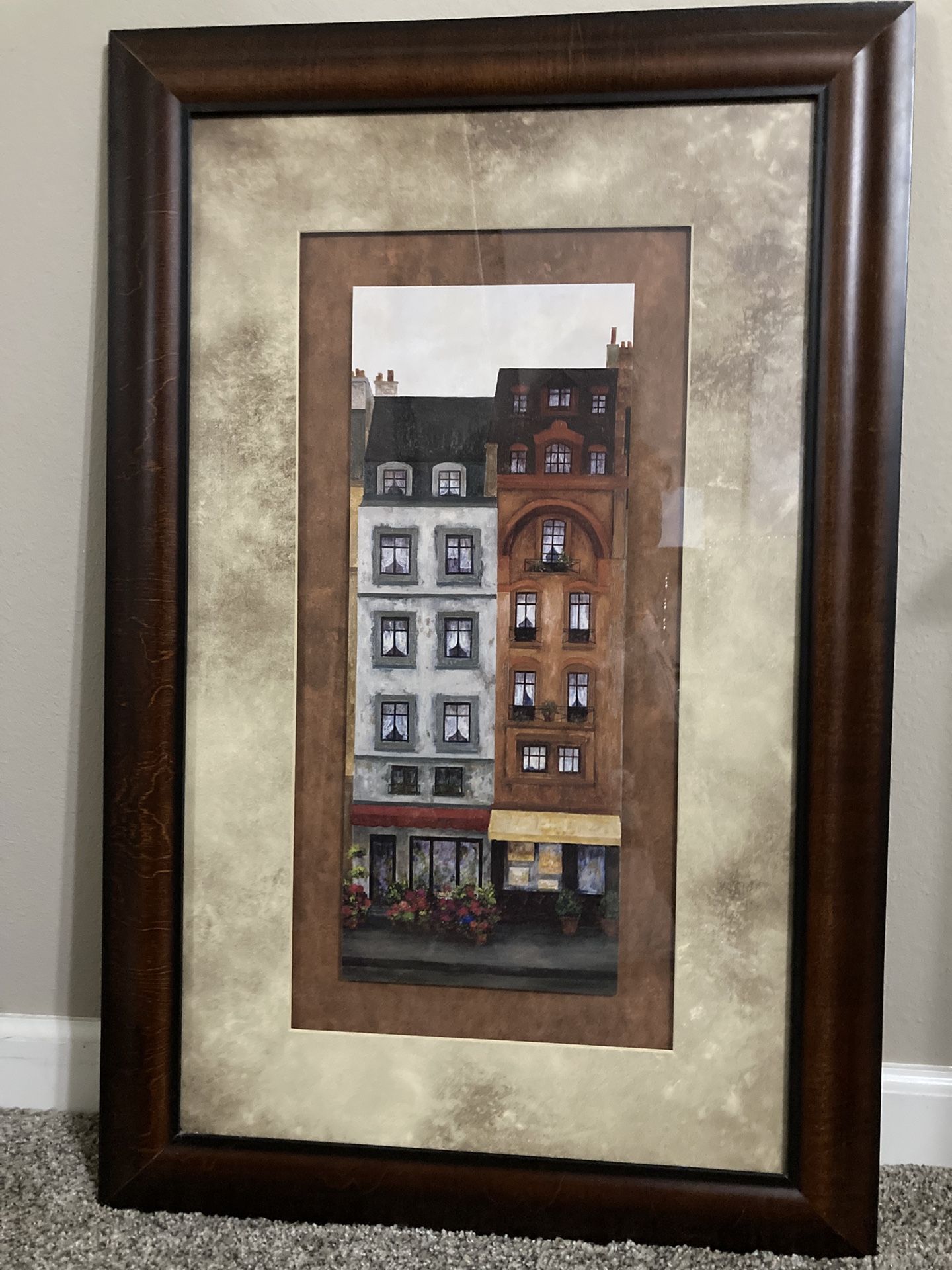 Picture, matted, with brown wood frame.