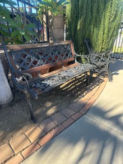 Iron wood bench  one complete and one to set up cast iron