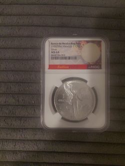 1982 Mo Mexico 1 Onza silver NGC MS64