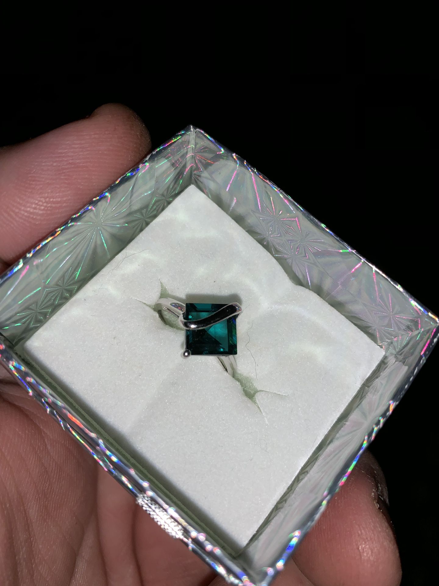 Sterling silver band with emerald