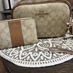 Coach crossbody camera bag and wallet.