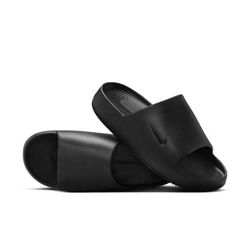 Black Nike slides 
