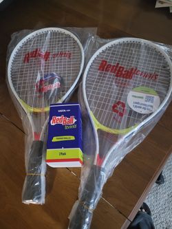 New tennis racket with balls