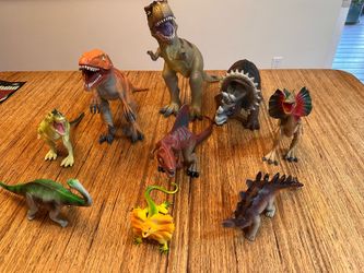9 dinosaur figurines