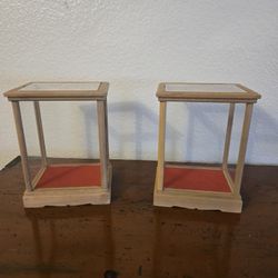 Pair of Vantage glass display cases for any statues or anything to keep a nice. The measurement: 5 1/2 w x 4 4 1/2 D x 7 1/2. $40 for both
