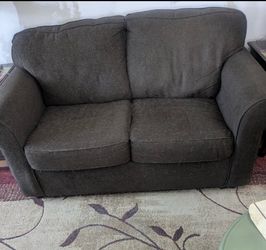 Small grey love seat