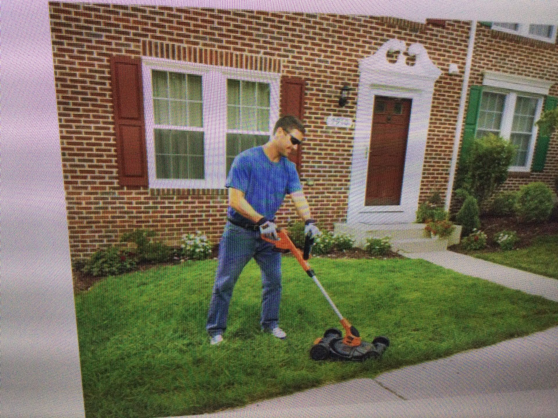 BLACK AND DECKER MINI LAWN MOWER AND TRIMER ..WITH ONE BATTERY AND CHARGER IN EXCELLENT CONDITION