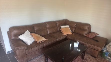 Perfect leather couch. Hardly sat on