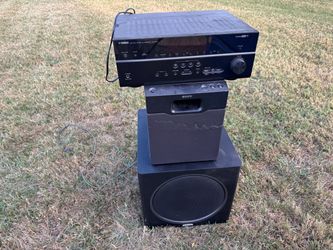 Yamaha  Receiver.  Middle Speaker: A Sony Bass Reflex Speaker,  Bottom Subwoofer