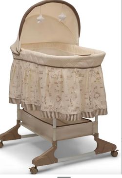 beige bassinet