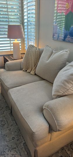 beige love seat couch