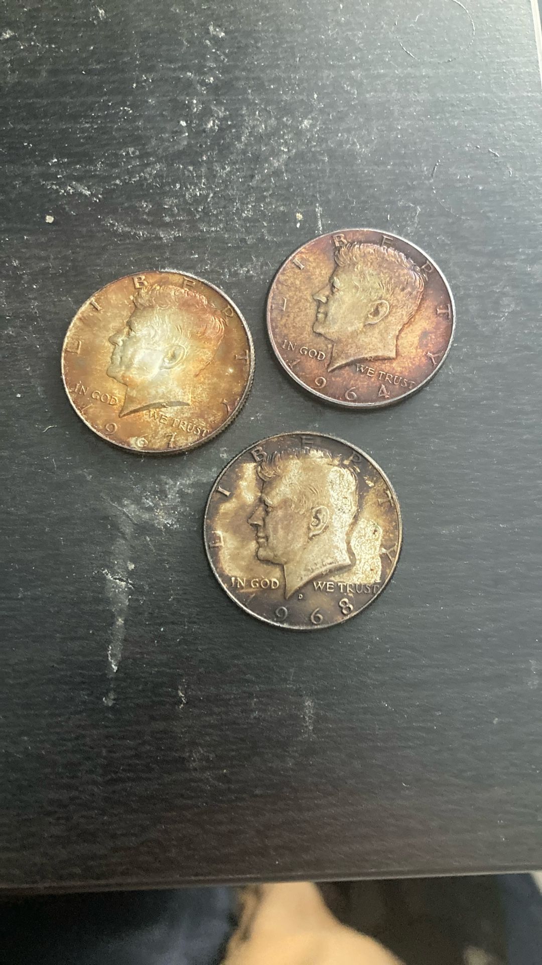 From-70’s Bank Roll Of Heavily Toned Bank Roll 60’s Silver Kennedy Half Dollars