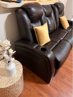 Leather sofa with recliner