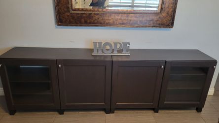 TWO BLACK/BROWN TV STANDS
