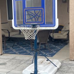 Swimming pool, basketball hoop