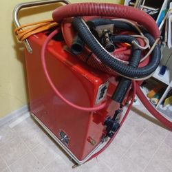 Vacuum Extractor With Pole And Couch Attachment.