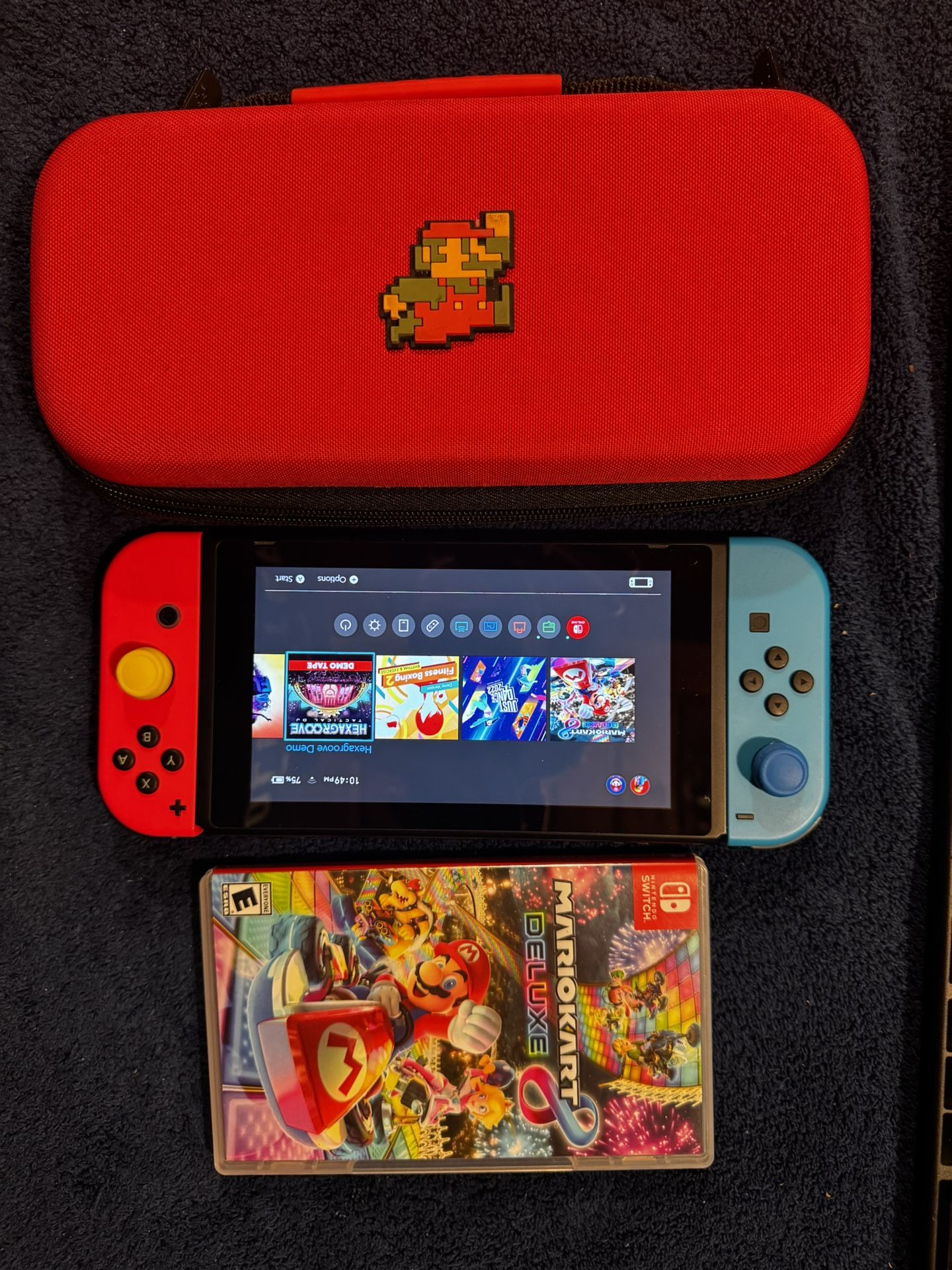 Nintendo switch + Mario kart delux + carry case
