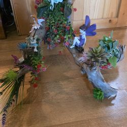 Log Decorated As A Fairy Garden 
