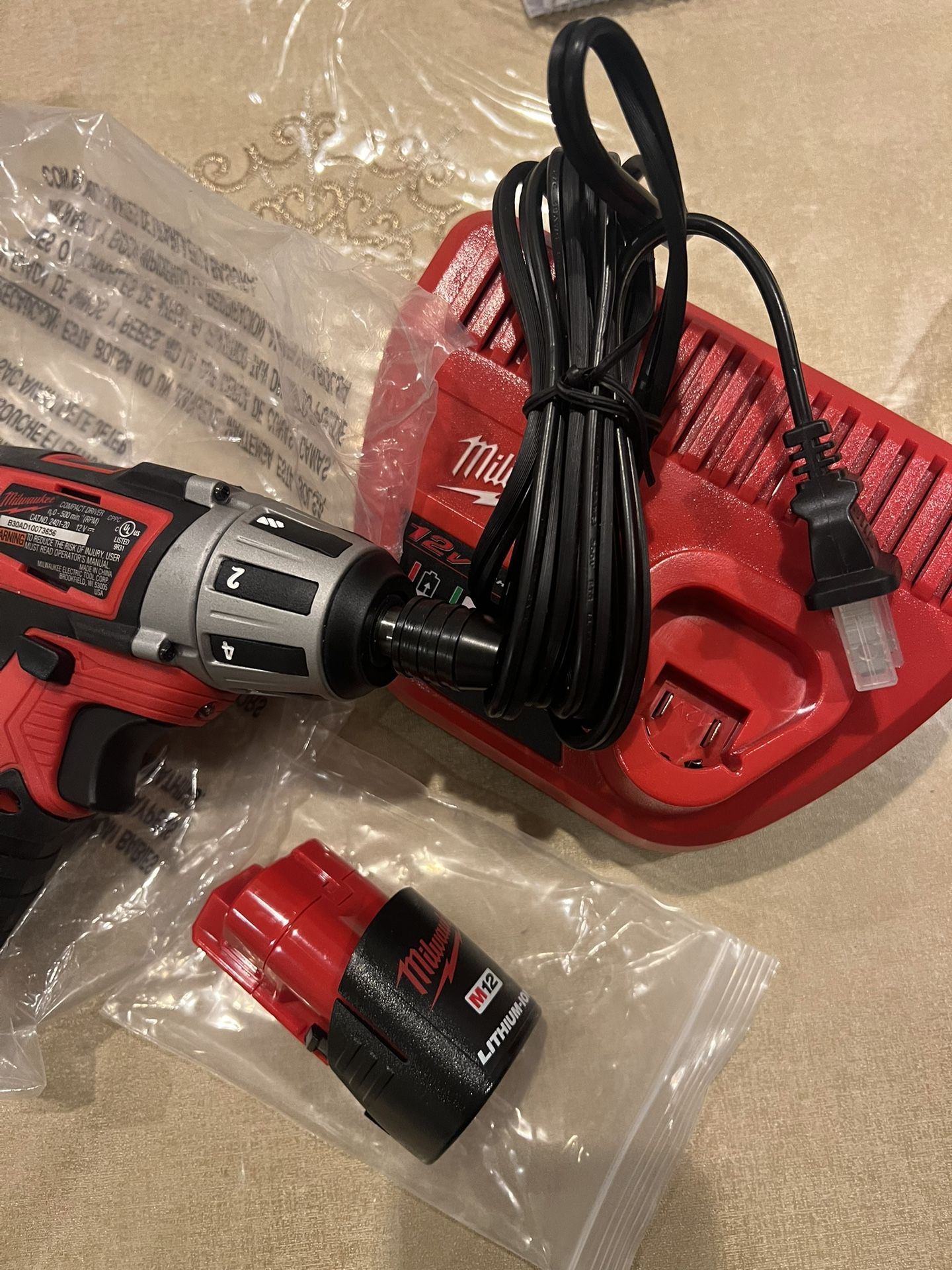 Milwaukee M12 Tool And Battery And Charger 