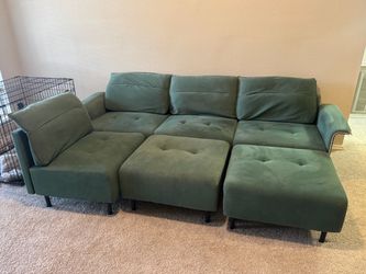 Green six person sofa with two ottoman’s
