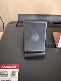 iPhone charging station and pink vent magnetic phone holder