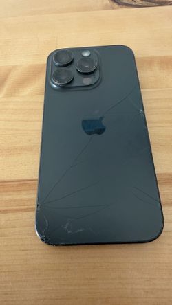 AT&T / Cricket iPhone 15 Pro 256GB Black Titanium - Cracked but works.