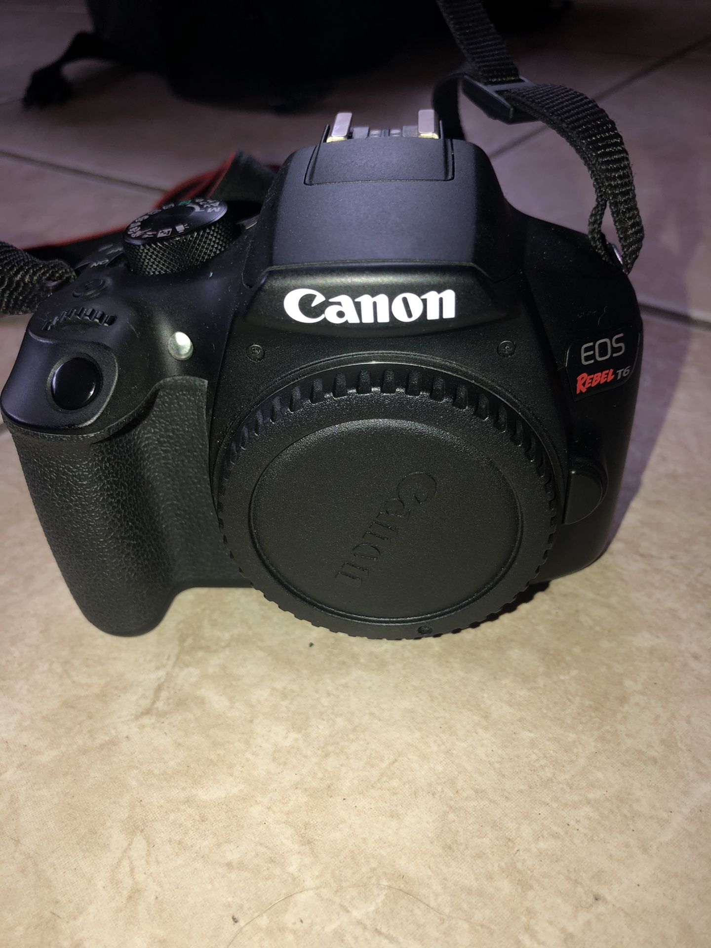 Canon Rebel T6 body, 18-35mm lens, 3 batteries and charger, case perfect starter kit or second camera