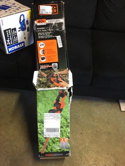 Brand new 24 in. 40V MAX Lithium-Ion Cordless POWERCUT Hedge Trimmer with (1) 1.5Ah Battery and Charger Included.