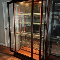 Two Bookshelves With Sliding Doors 