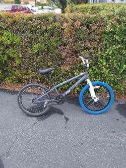 20 inch BMX bike diamond back with blue tire and black tire used.