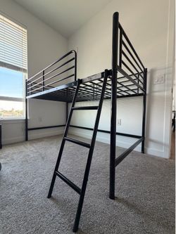 Twin metal low bunk bed with ladder
