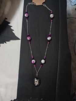 Purple and black glass beads on silver chain necklace